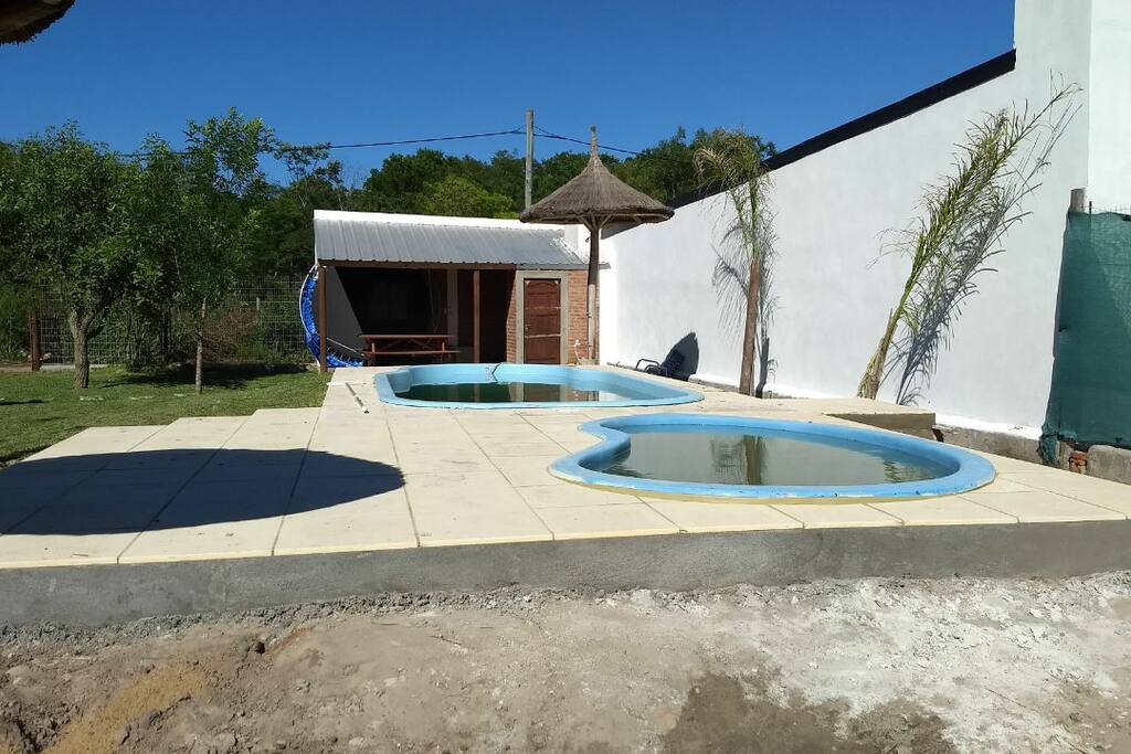 Piscinas y quincho