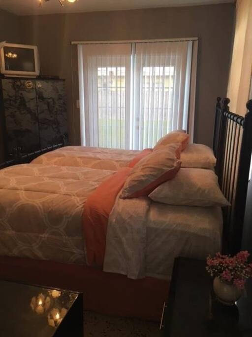 Room's bed and entrance door