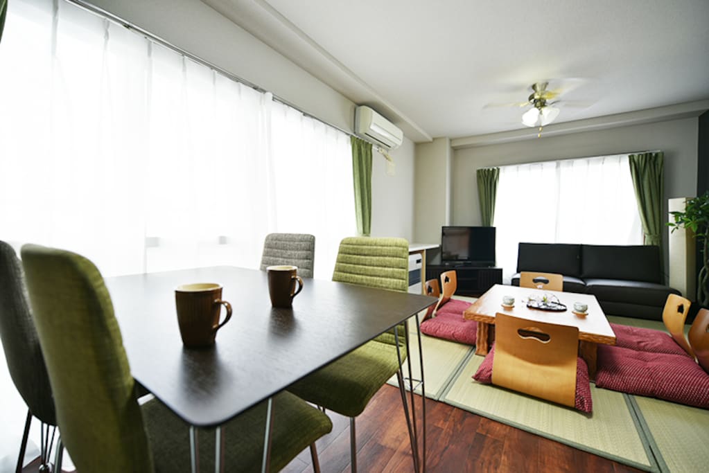 Modern Japanese space- Low table and legless chairs. Dining table set and sofa.