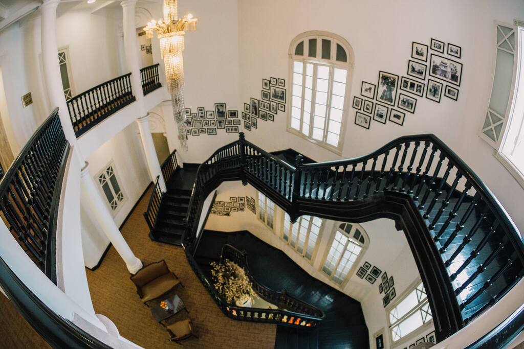 The 100 years wood stair with pictures showing the most important events of Hanoi for the last 100 years.