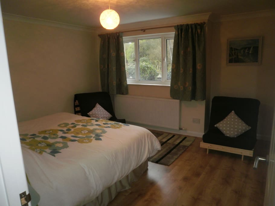 Bedroom with large double or two singles, plus two single futons