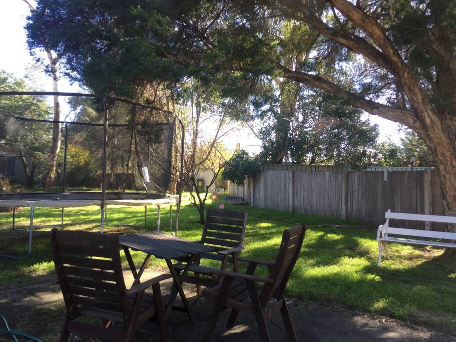 Outdoor area and trampoline