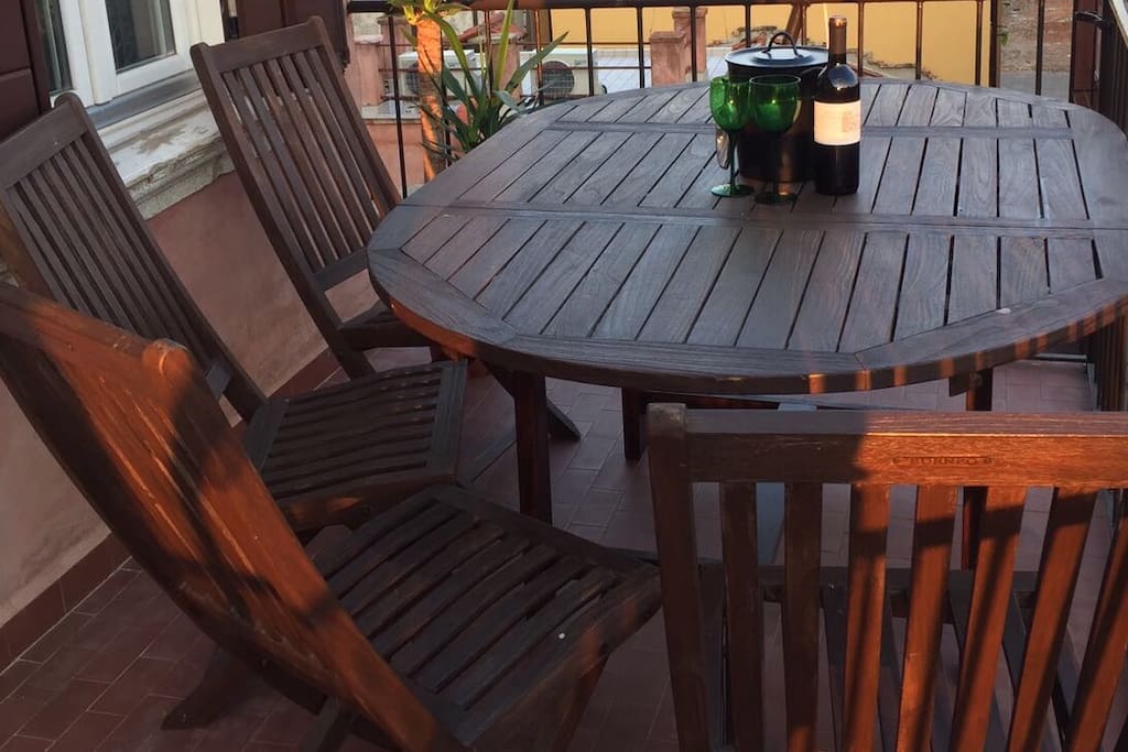 Dinning table on the balcony makes romantic atmosphere