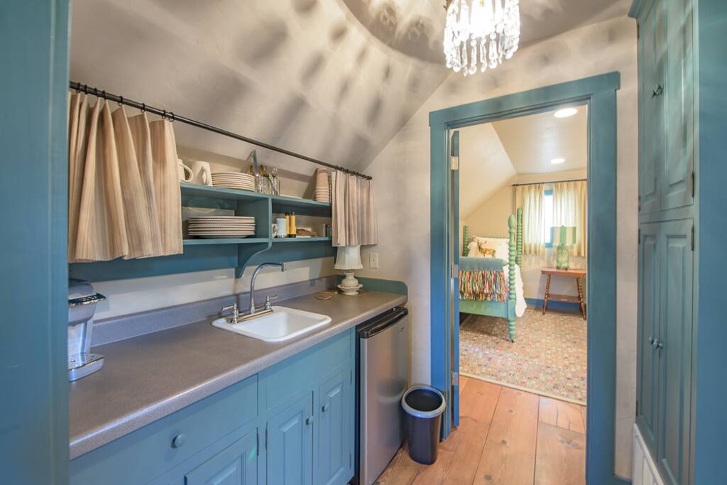 The upstairs kitchennete. It is small, using the space in the hallway between rooms, and the bathroom, but is perfect for making coffee.