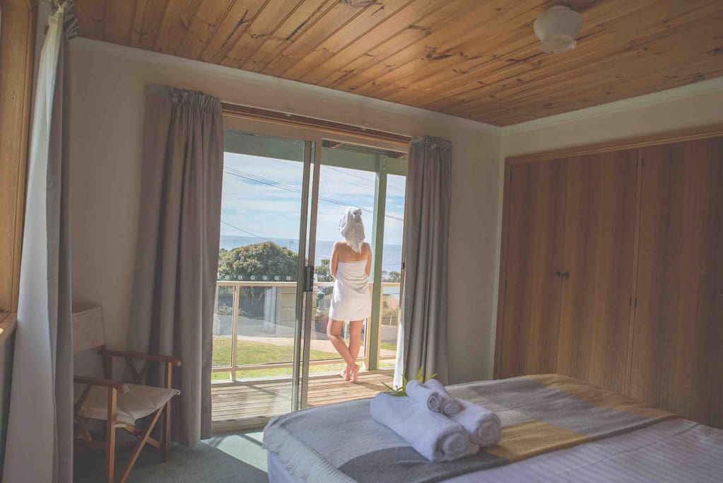 Master bedroom has deck with water views