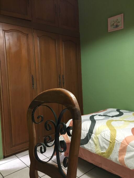 Individual bead, full closeth, and desk with chair