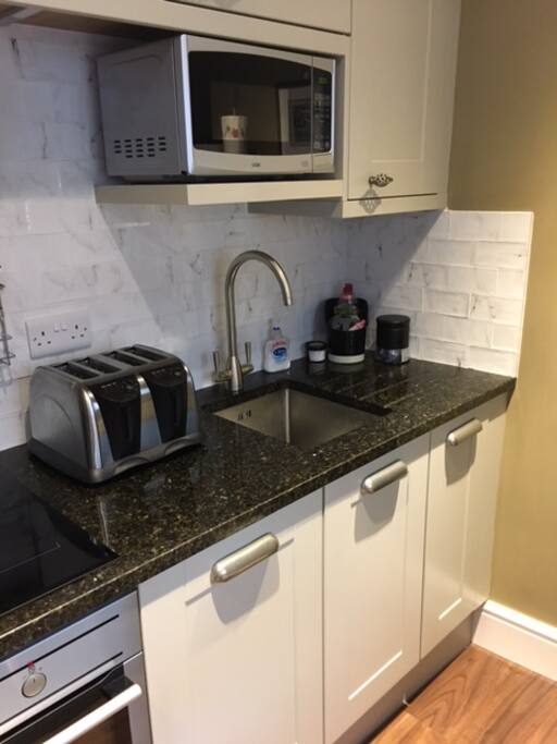 Kitchen with Stove, Oven Dishwasher, Refrigerator, Freezer
