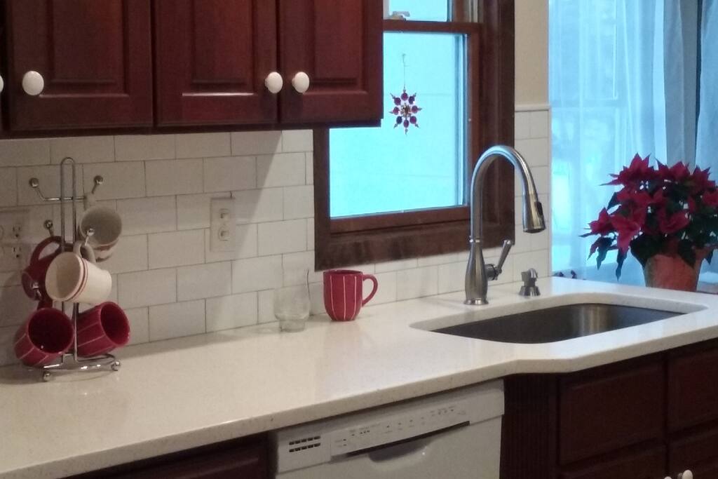 Kitchen has quartz countertops
