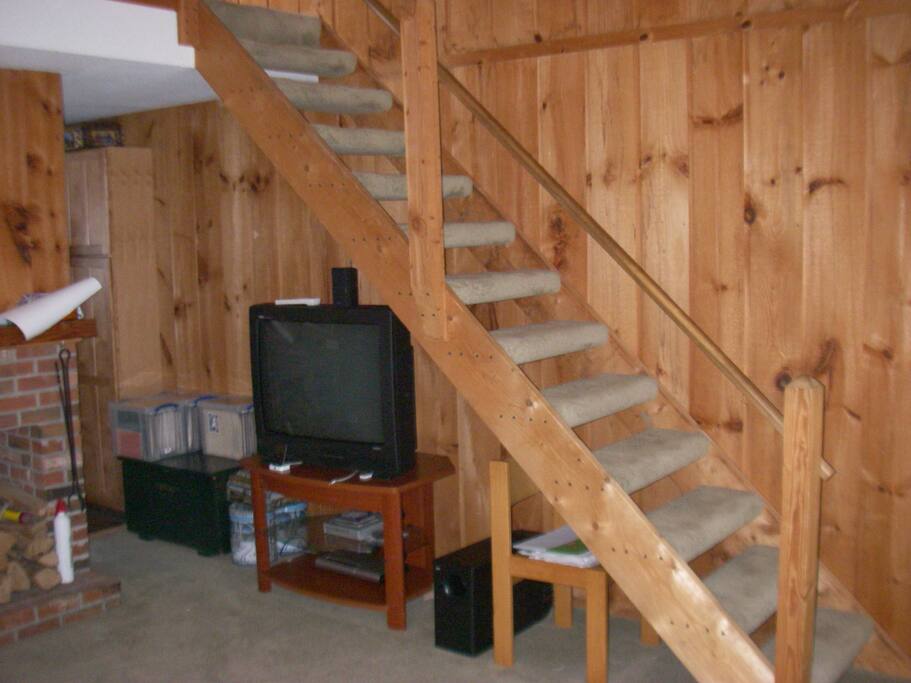 Living Room with stairs to loft