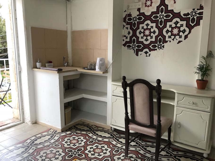 Vintage writing desk and kitchenette for your morning coffee or tea