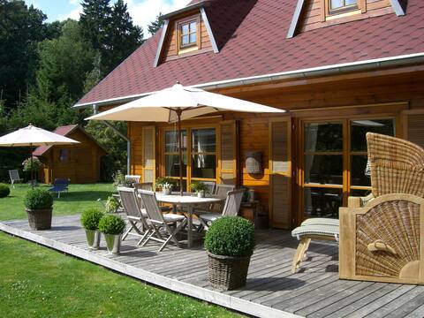 stylish cottage with beach chair and barbecue kota