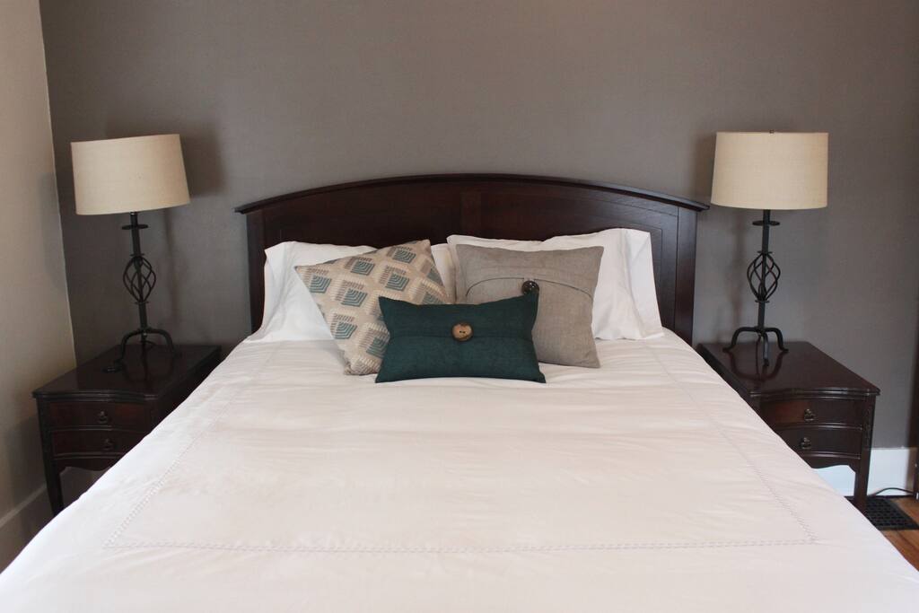 Front bedroom, with queen bed and antique armoire
