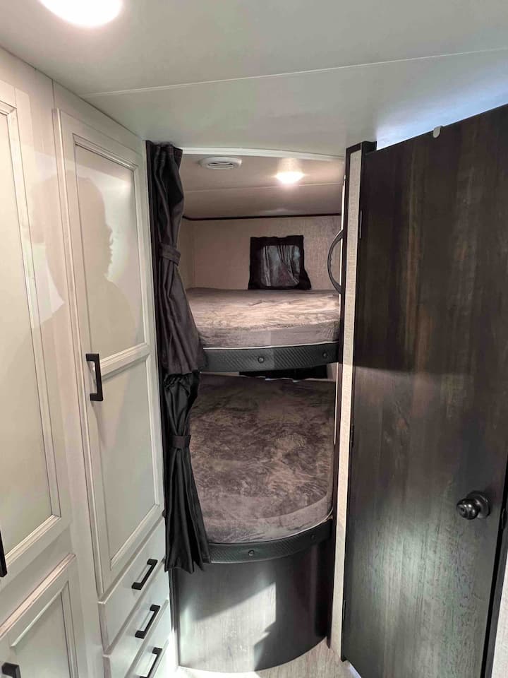 Roomy bunks with privacy curtains and a great viewing windows