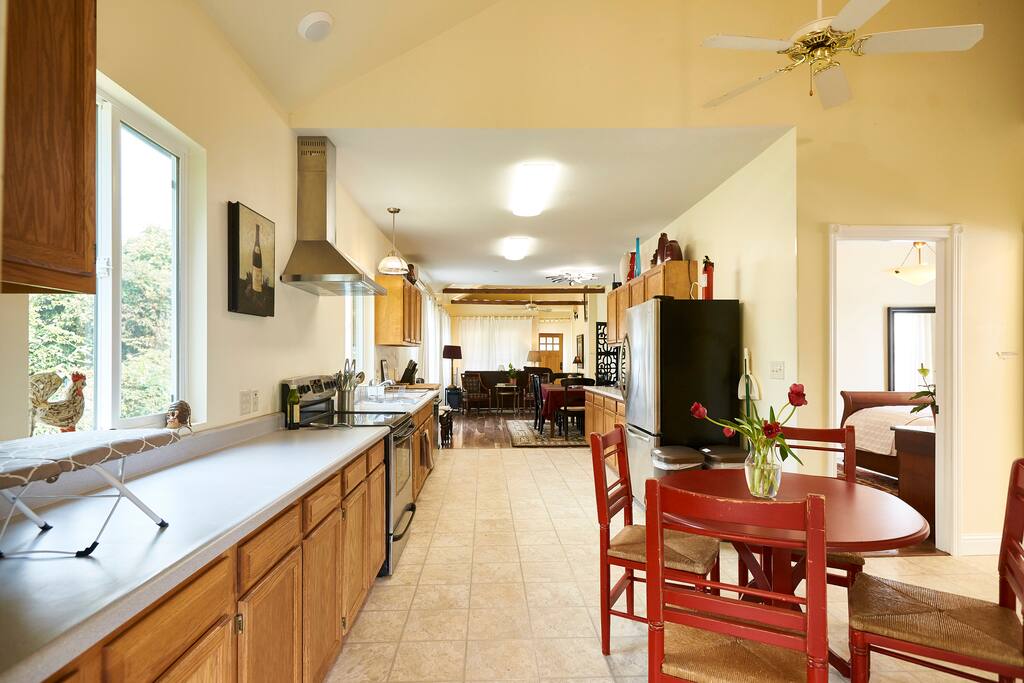 Open floor plan: Living room, reading area, dining table, breakfast nook and full kitchen in addition to the 4-bedroom 2-bath accommodations