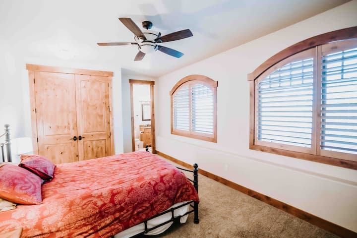 Lower Level Master Bedroom with queen bed and en suite full bath.