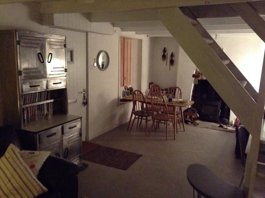 Living room with dining area, some games and DVD's.