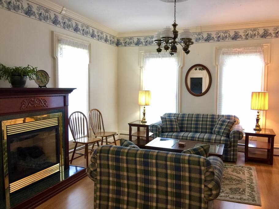 Living room with gas fireplace.