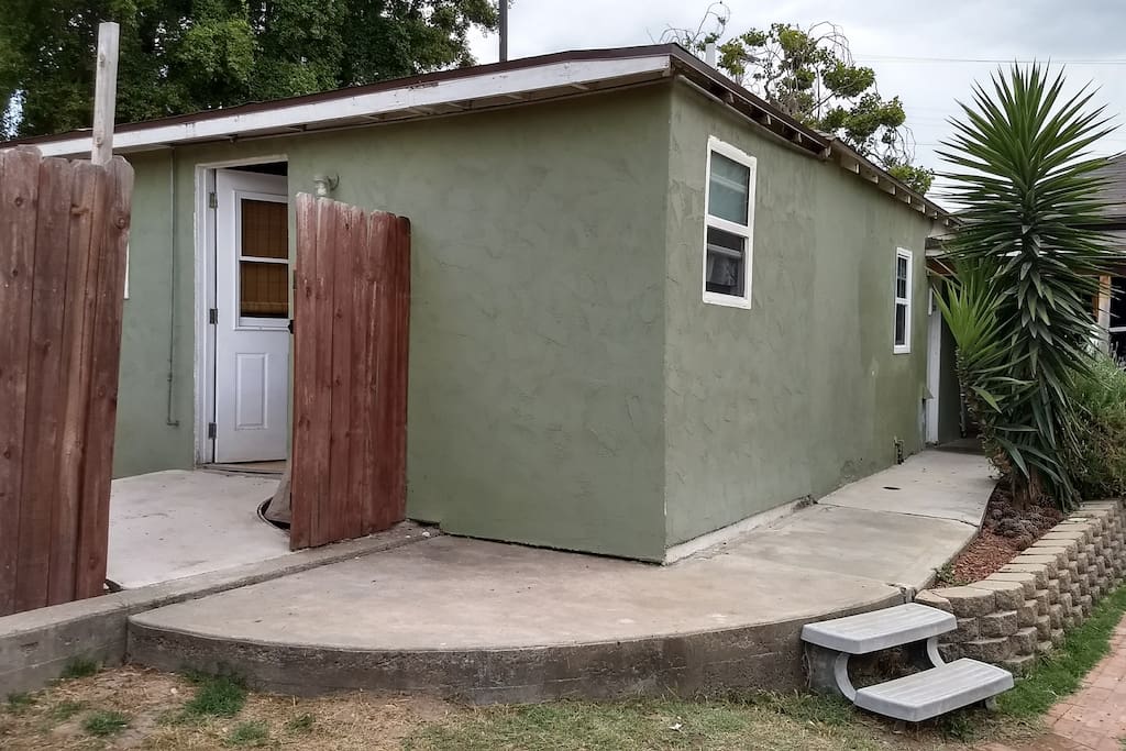 Studio behind the garage. This is the studio being offered. It is not attached to the house.