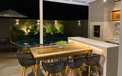 House in a condominium with a gourmet space and a swimming pool