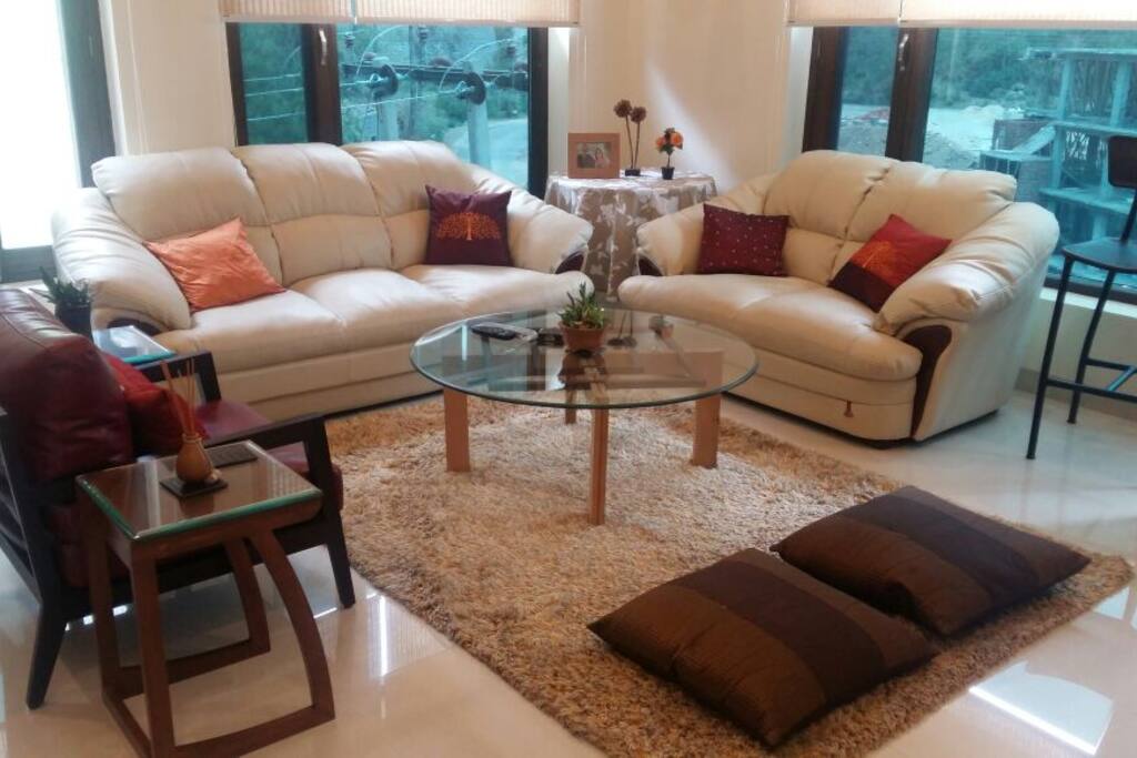 Living room with large windows ensuring you never miss the views of the valley