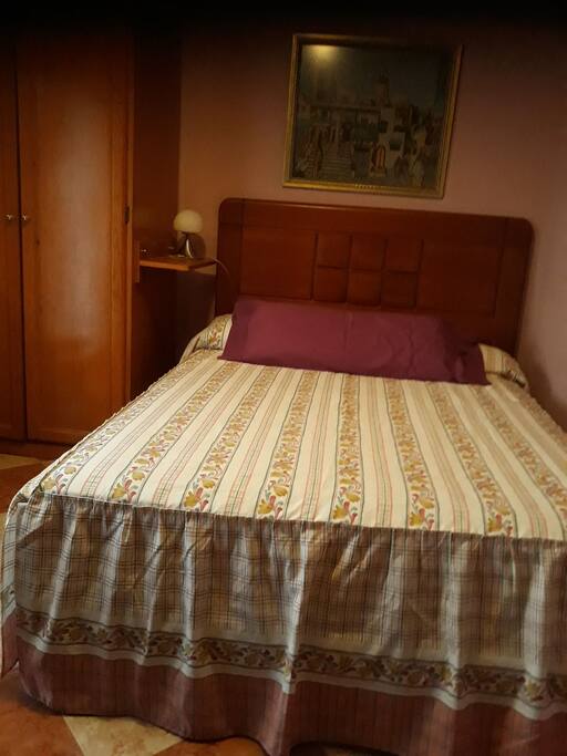 Dormitorio. cama matrimonio