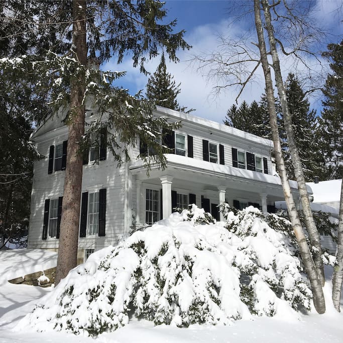 side view of house in winter