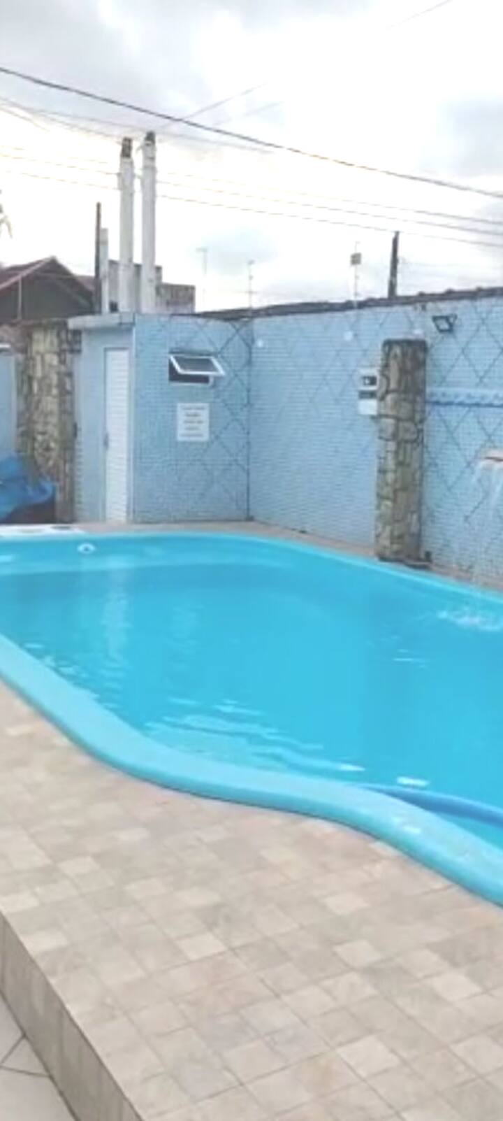 Sobrado with pool and a garage for 4 cars.