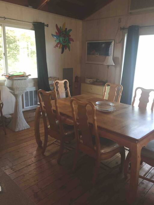 Big dining room table seats 6 can seat 8.