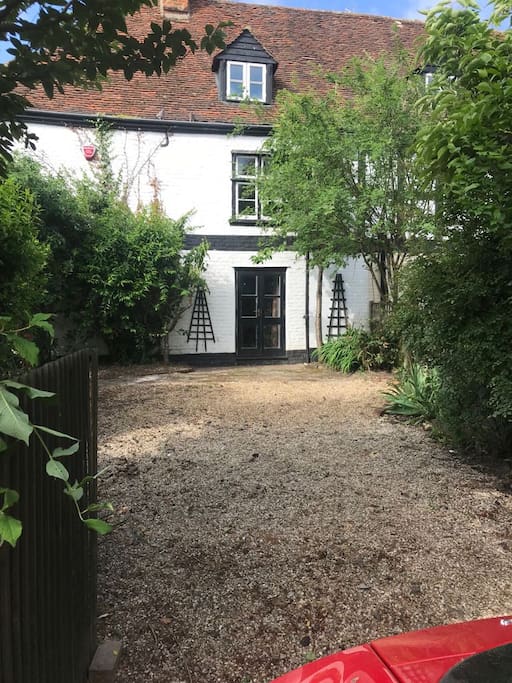 Parking is at the side of the house. Enough space for two cars