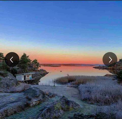 Large cabin with private shoreline and rubber boat