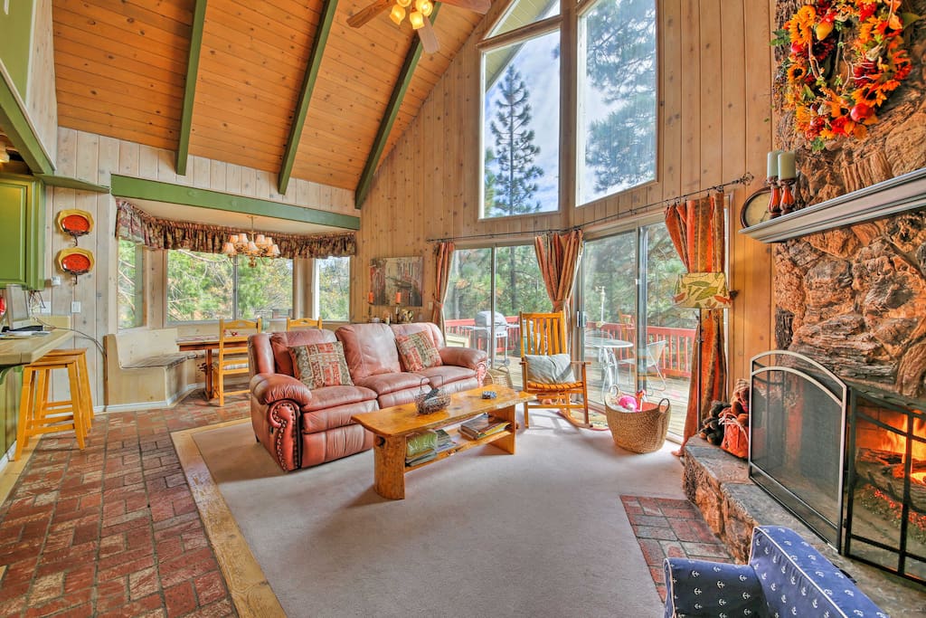 From the A-frame ceilings to the natural stone fireplace, this home showcases unique cabin charm around every corner!