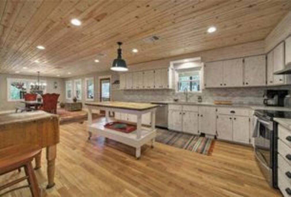 Large open concept kitchen and dinning room with all stainless steel appliances
