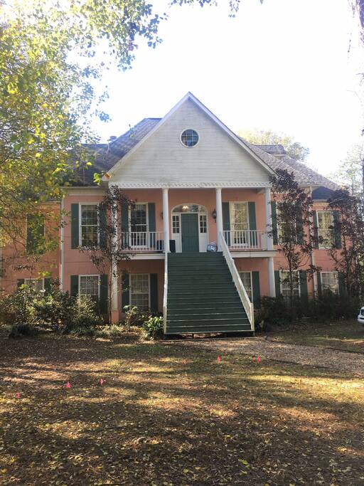 Front of the house. It is set off the road with circular drive. Located in flower estates.