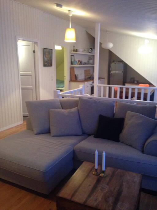The open living room with a view over to the kitchen