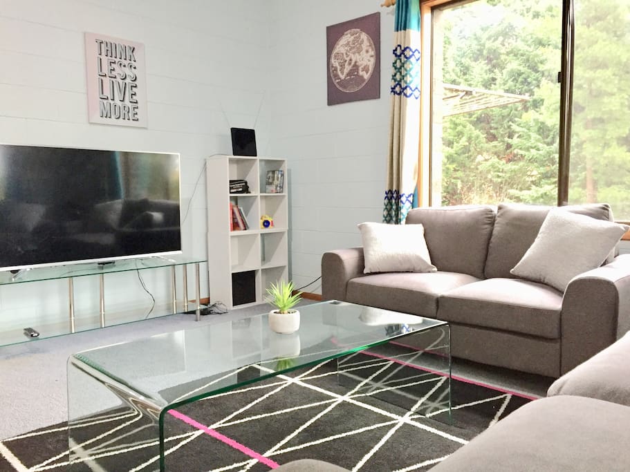 Living room with big screen smart TV and Netflix