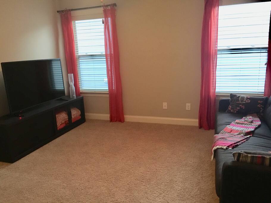 Couch and 55” TV in the loft