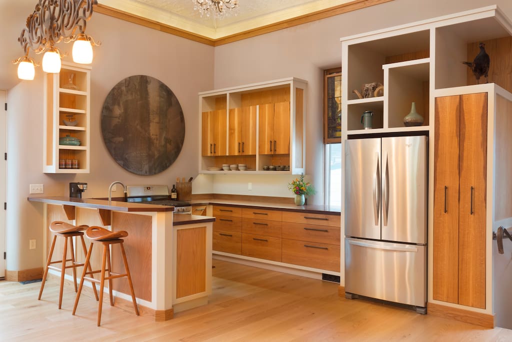 spacious kitchen with custom oak cabinetry