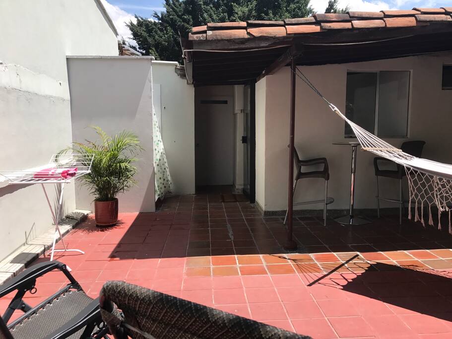 House has a beautiful terrace on the floor above your room. Enjoy the outdoor shower, hammock, deck chairs and bar stools.