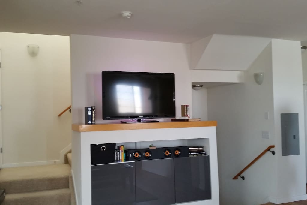Stairs lead to second level, bedroom and full bathroom
