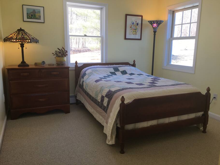 Bedroom w/ double bed, closet, dresser