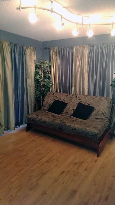This futon has a real bed mattress, so that you don't have to feel like you are sleeping on boards!