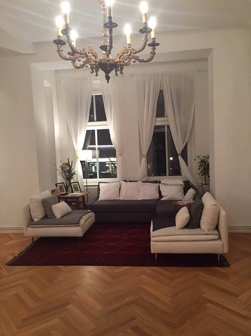 Living room with sofa that opens up for leg room, with an option for an extra double bed.