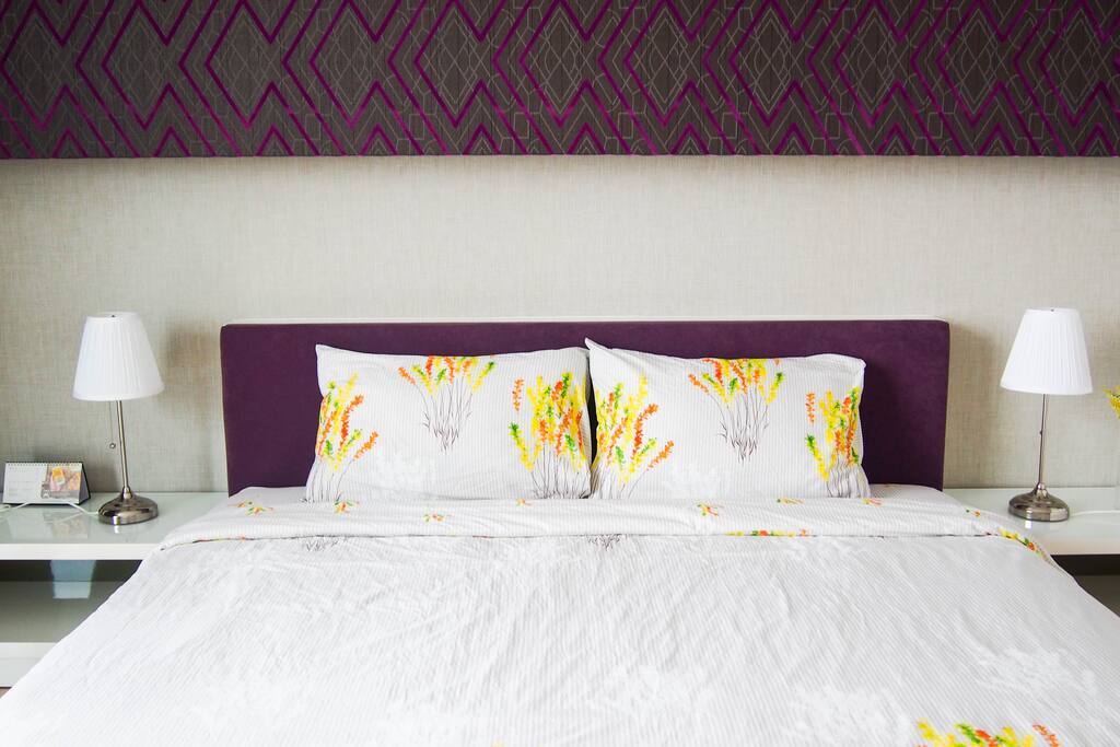 Cosy designed bedroom with king size bed
