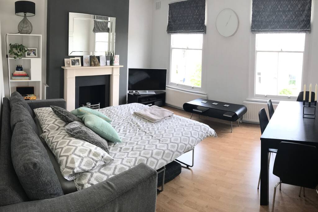 Lounge with sofa bed made up