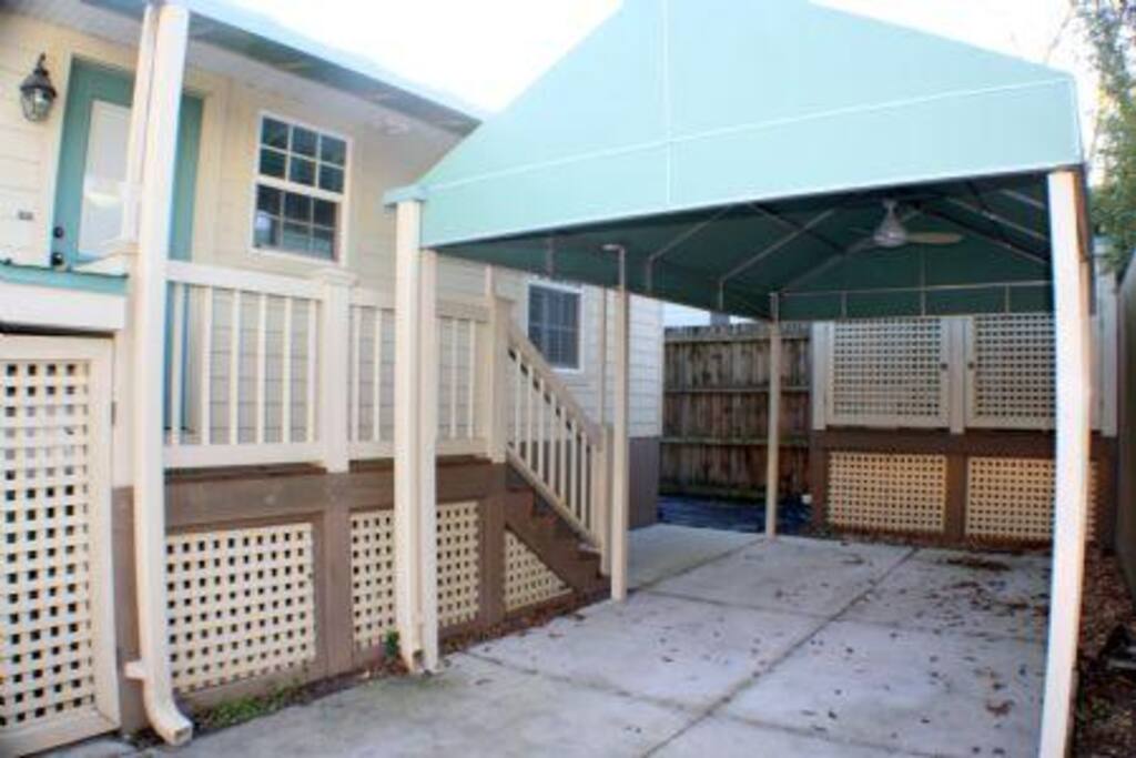 Covered parking behind home
