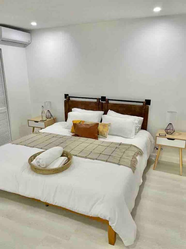 Second Bedroom has King Size Bed and Ensuite Bathroom with Tub