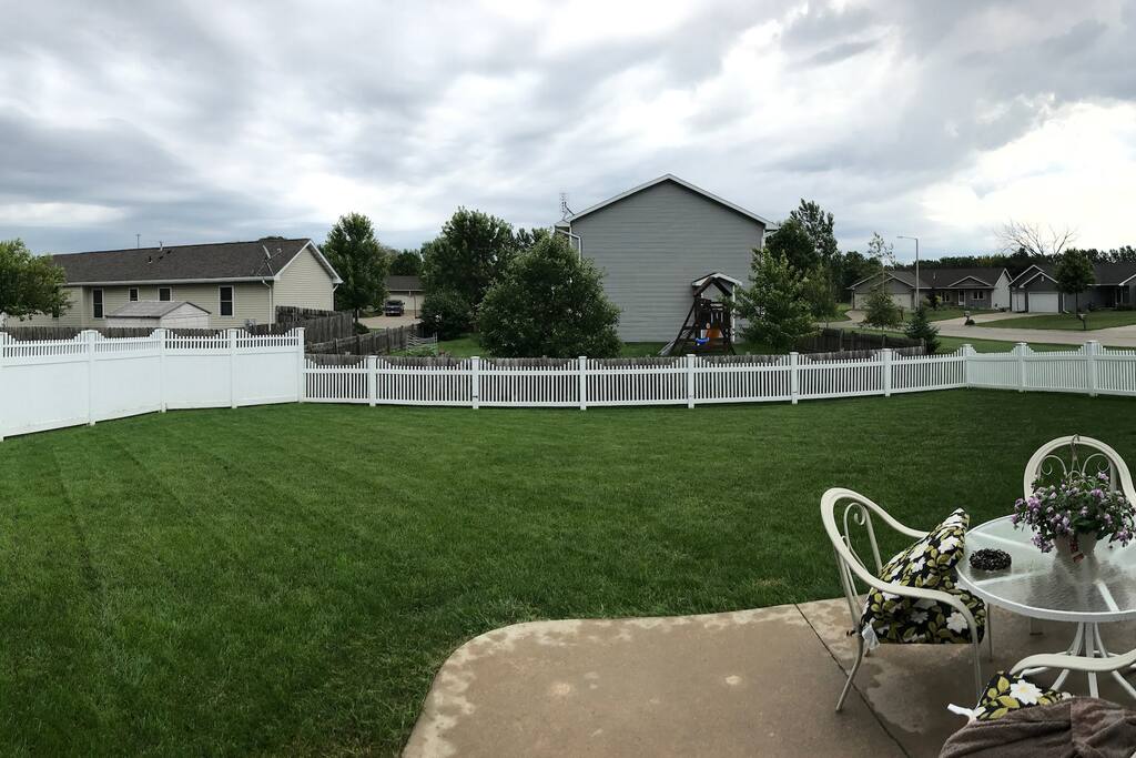 Fenced in backyard perfect for relaxing and grilling out.
