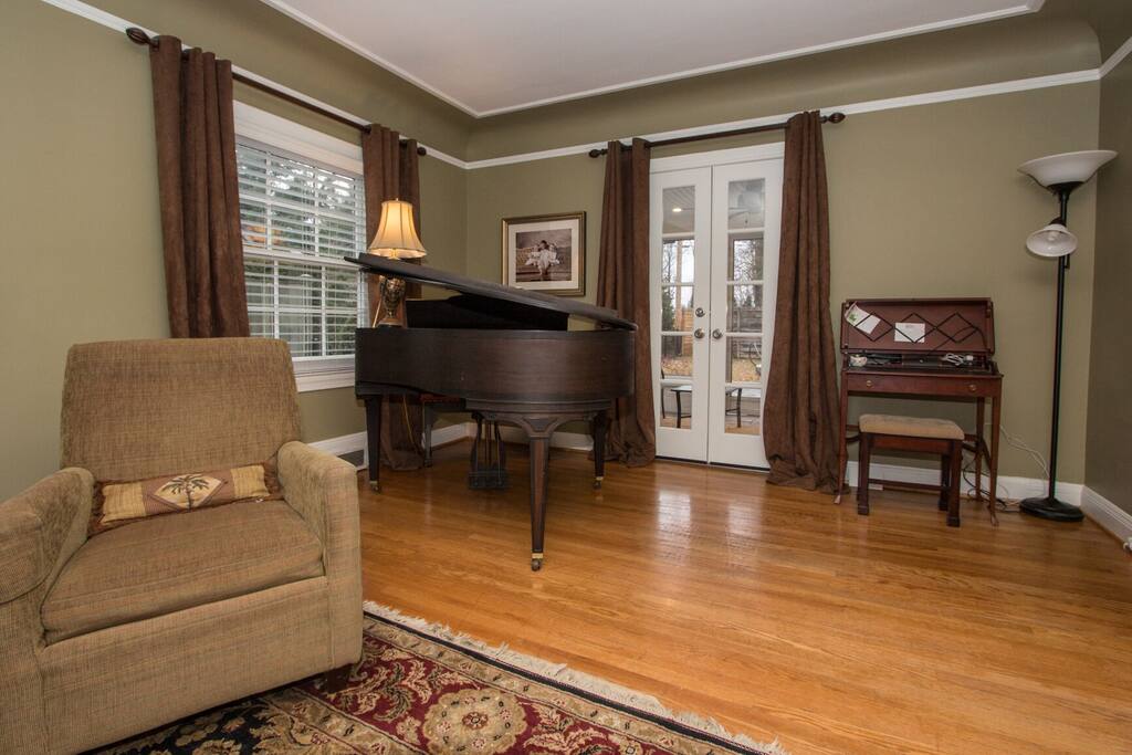 Baby grand piano (ready for singalongs!)