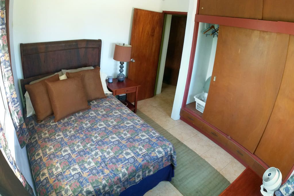 Guest bedroom from inside looking north towards door.