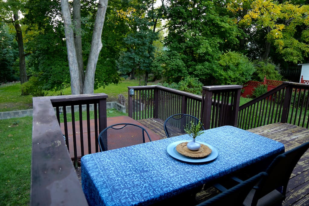 outdoor patio and back yard bordering public park